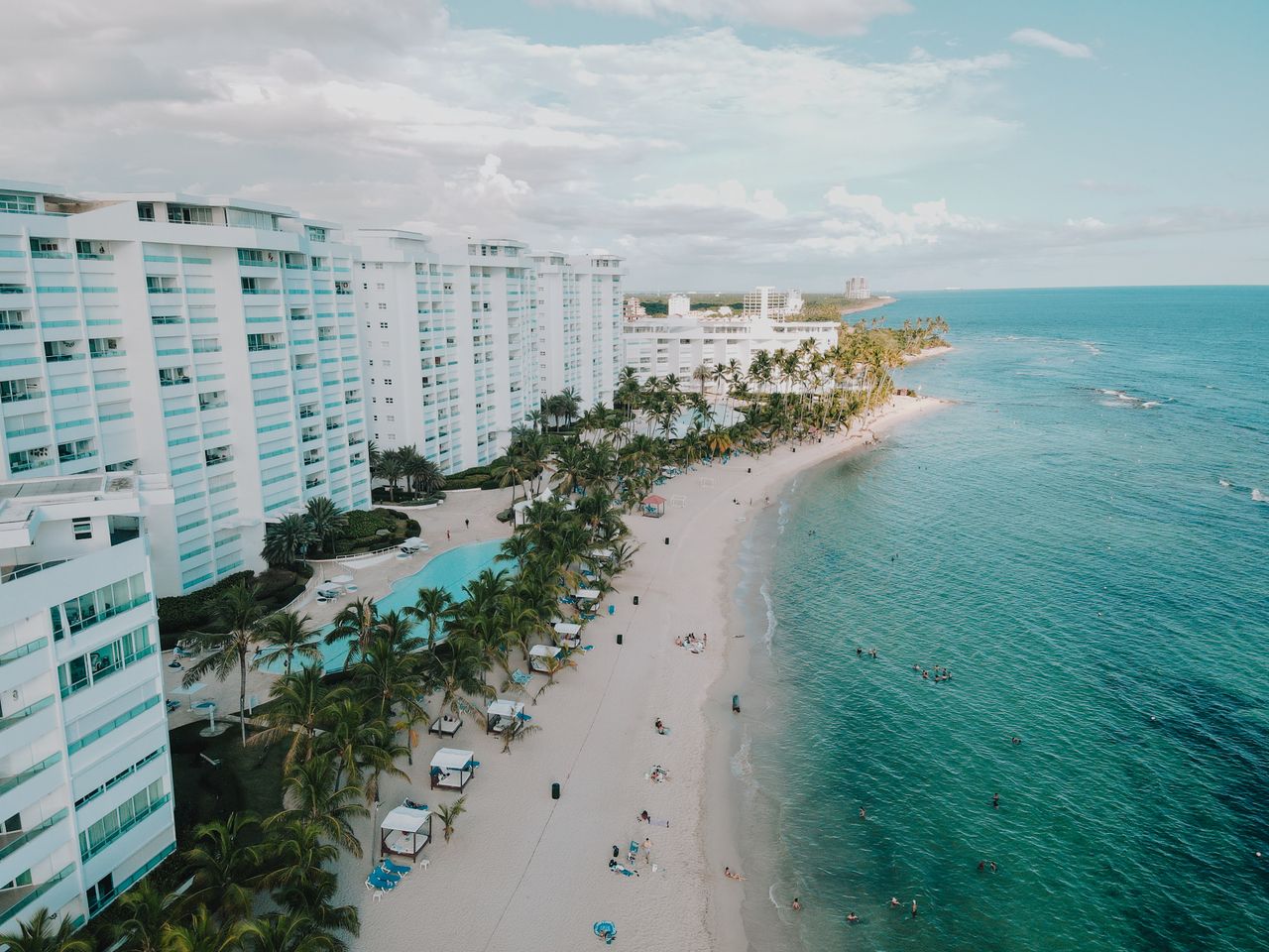 Mastering the First Impression: Your intriguing post title goes here A stunning aerial view of luxury beachfront resorts in Juan Dolio, Dominican Republic.