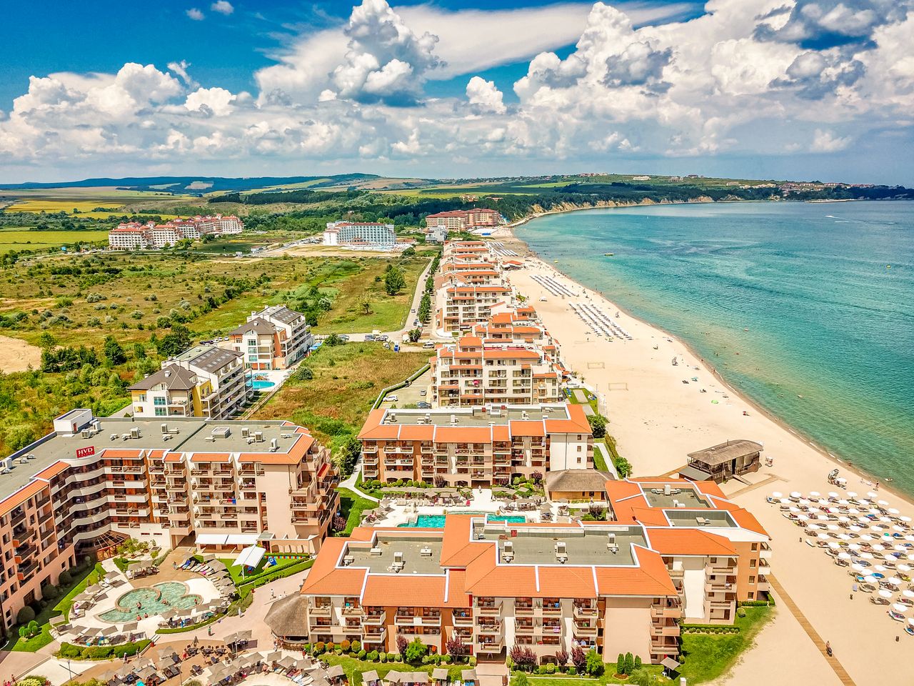 Crafting Captivating Headlines: Your awesome post title goes here Stunning aerial view of beachside resorts and scenic coastline in Obzor, Bulgaria.